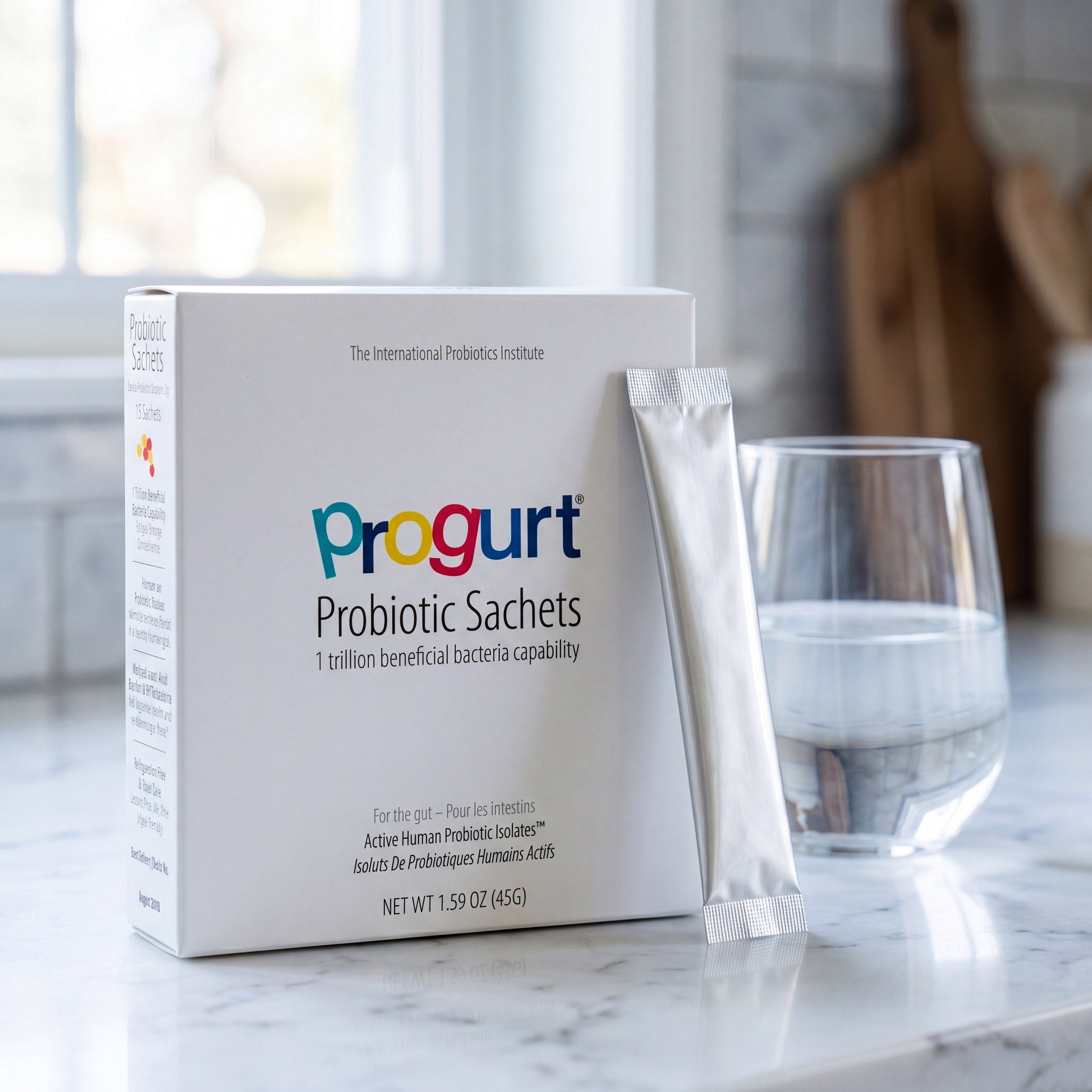 Progurt Probiotic Sachets box beside a glass of water in a calm everyday routine