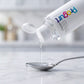 Chloride inside — clear ionic mineral liquid, a teaspoon fill on marble