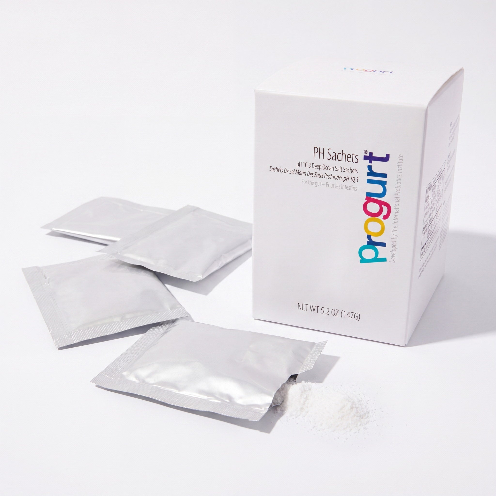 pH Sachets inside — fine white pH-mineral powder from an open sachet